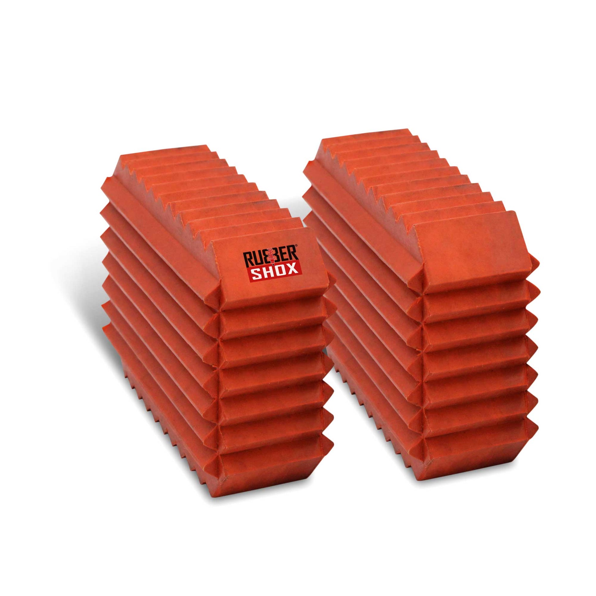 Stack of red air springs with 'Rufener Shox' branding on a white background